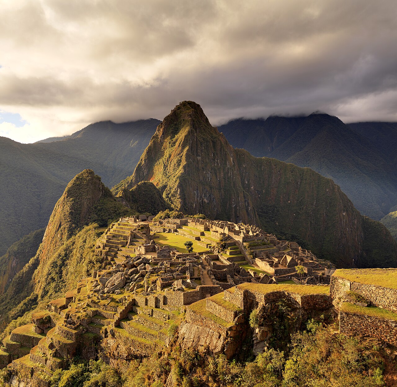 The stone terraces of Machu Picchu below the peak of Huayna Picchu